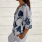 Jeanne | Elegant Blomstret Bluse – Central Knaplukning Og Korte Ærmer 